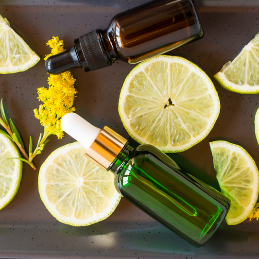 Bottles of cbd oil with lemon slices